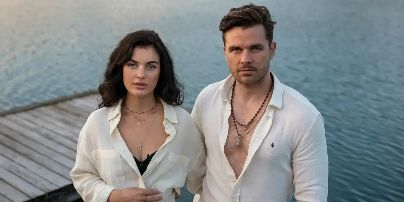 Soulmate traits: A spiritual journey of connection and understanding A mystical illustration showing two souls connecting through ethereal light, representing the deep spiritual bond between soulmates